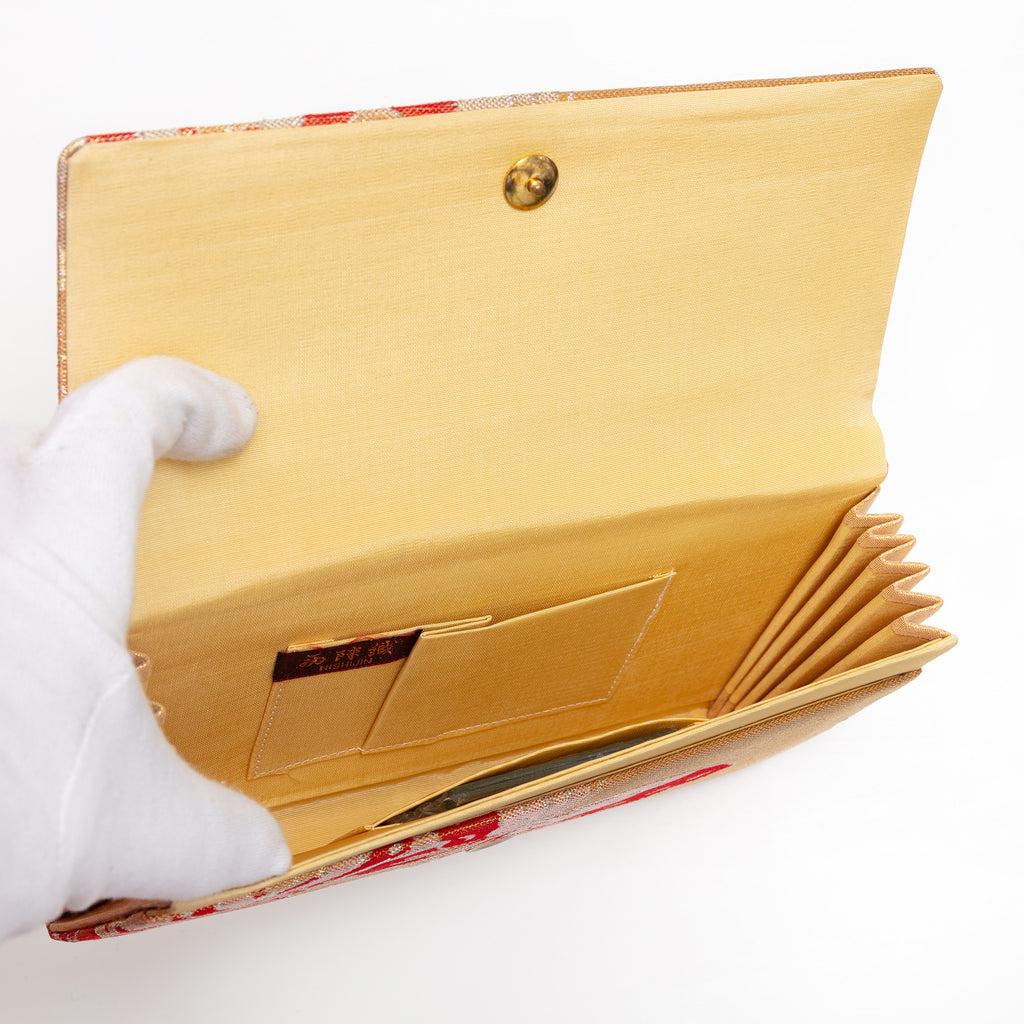Original vintage mirror in original wrapping inside Japanese silk clutch with interior pockets in buttercream silk.