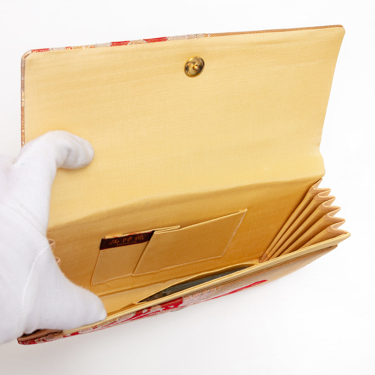 Original vintage mirror in original wrapping inside Japanese silk clutch with interior pockets in buttercream silk.