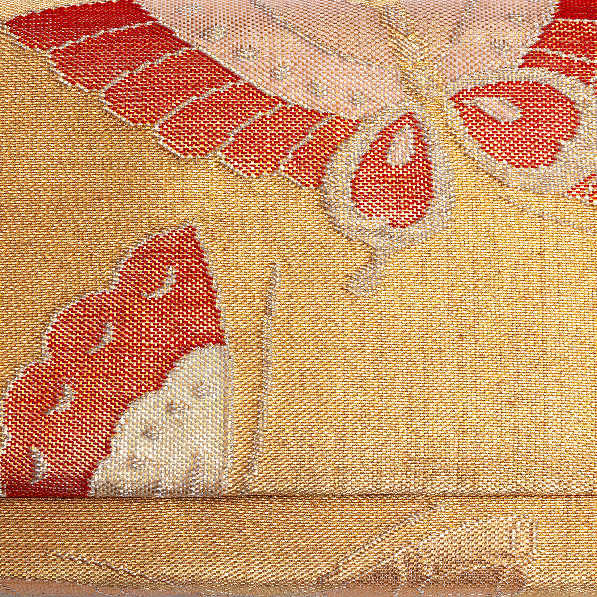 Detail of the woven metallic gold kimono silk clutch with red butterflies motif.