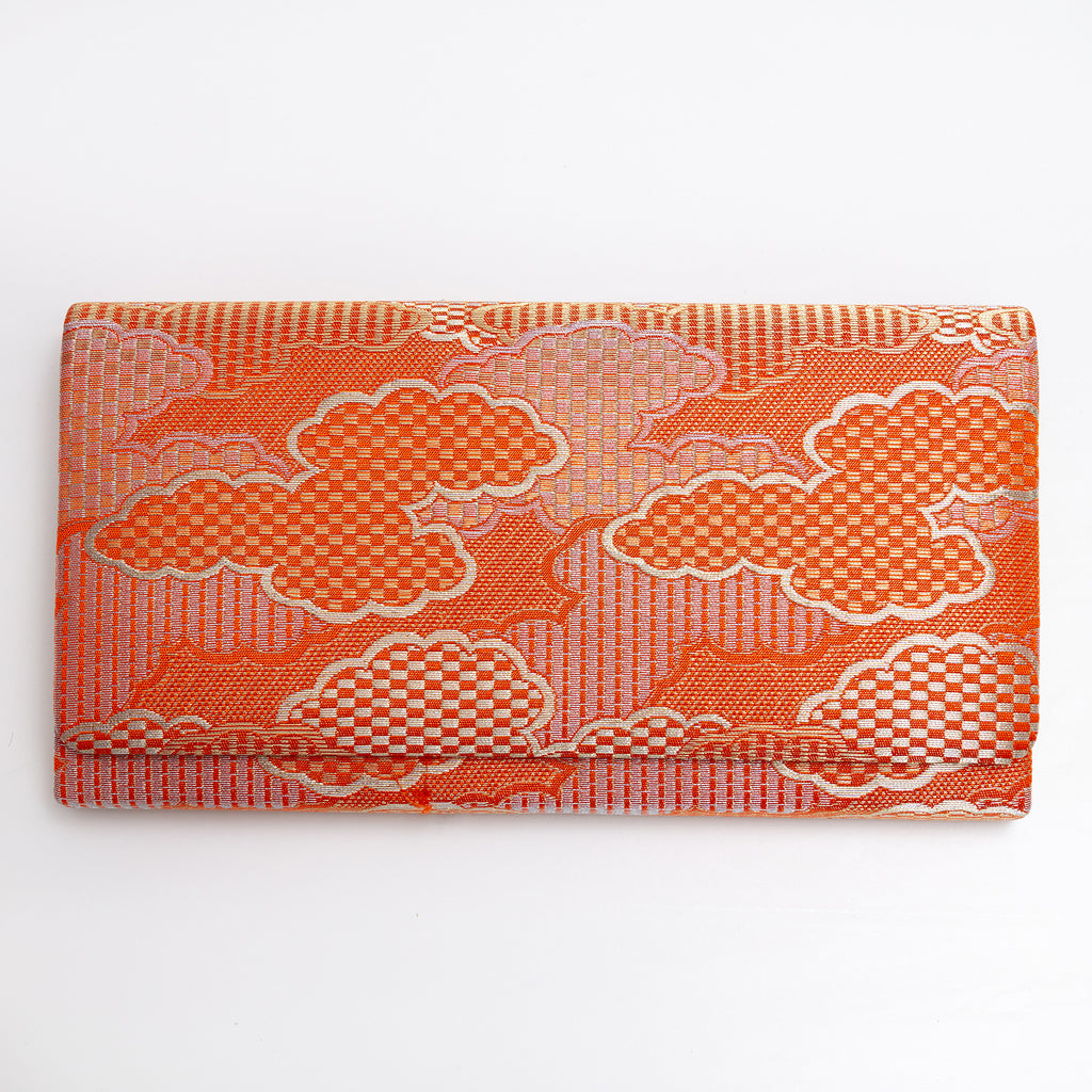Orange and gold Japanese silk foldover clutch with graphic cloud design