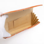 Beige silk interior with one pocket inside vintage Japanese clutch