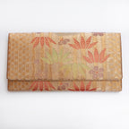 Bronze-gold Japanese silk envelope clutch with bamboo leaves and muted floral details