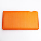 Back of metallic orange Japanese silk foldover clutch