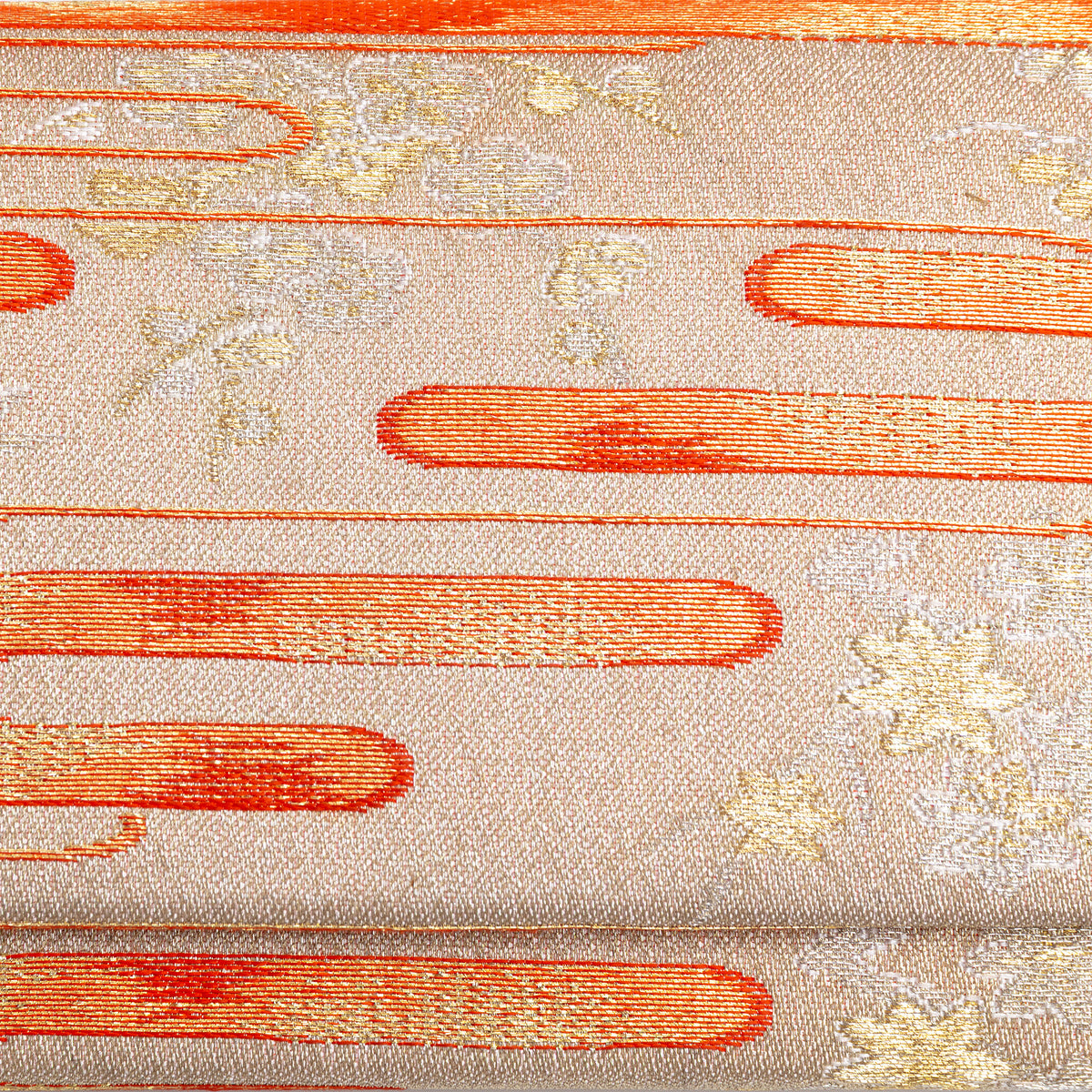Close-up of orange kasumi mist and delicate gold floral motifs woven into pale gold vintage kimono silk clutch bag