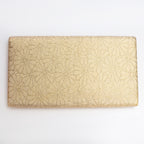 Back of metallic gold Japanese silk foldover clutch with chrysanthemum pattern