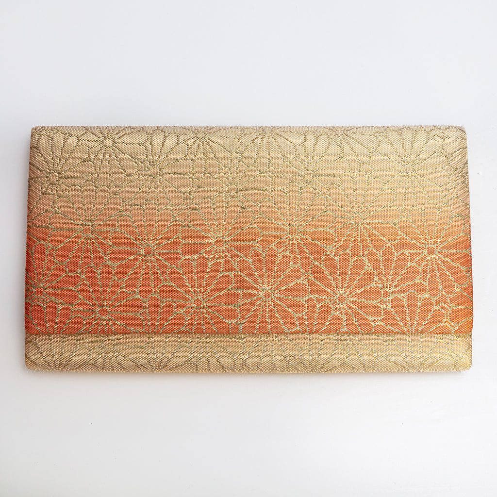 Gold and orange vintage Japanese silk foldover clutch with woven chrysanthemum motifs