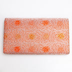Back of peach and silver Japanese kimono silk envelope clutch with abstract woven design