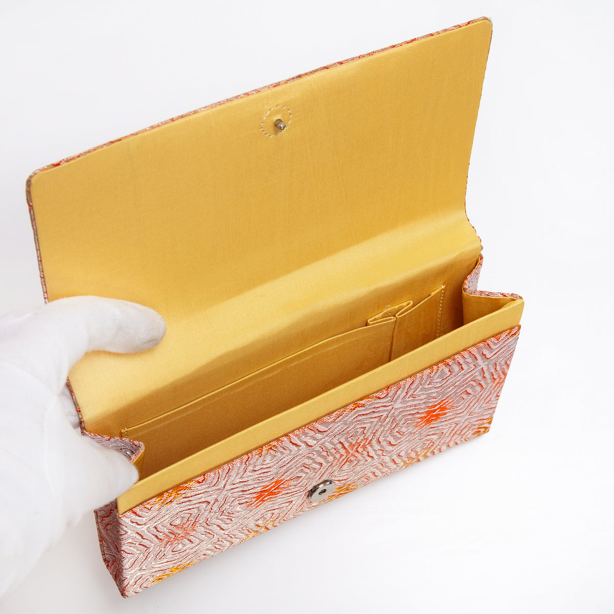 Butter silk interior with two pockets and two compartments inside vintage Japanese envelope clutch