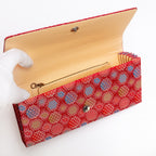 Cream twill silk interior with two pockets including zipped pocket inside vintage Japanese envelope clutch