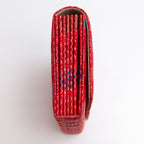 Side view of long vermilion red Japanese silk envelope clutch
