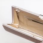 Pale gold sayagata silk lining with interior pockets inside vintage Japanese clutch bag