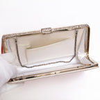 Open vintage Japanese silk clutch bag with silver-tone chain tucked inside