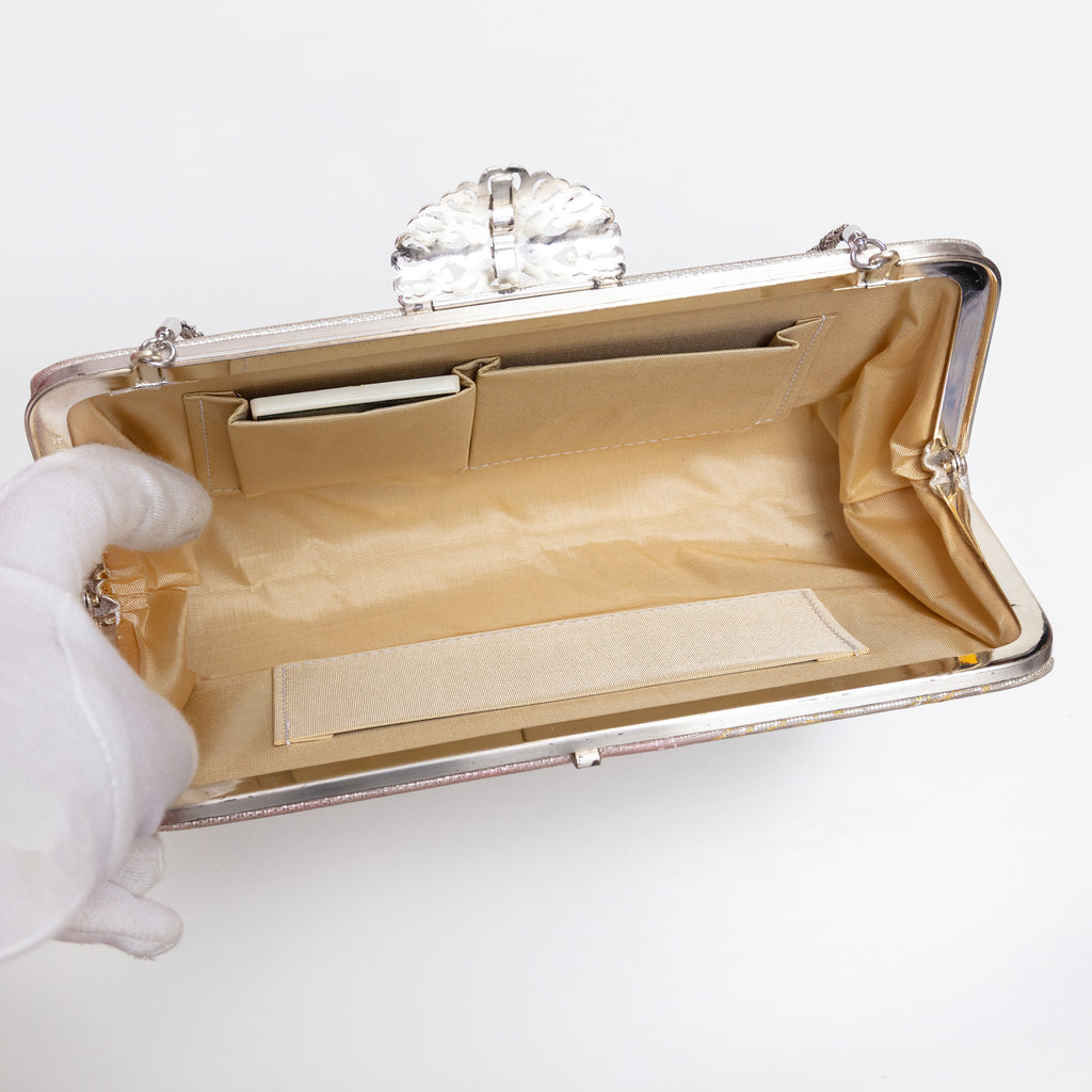 Open vintage Japanese silk clutch bag with silver-tone chain extended, three internal pockets and original vintage mirror.