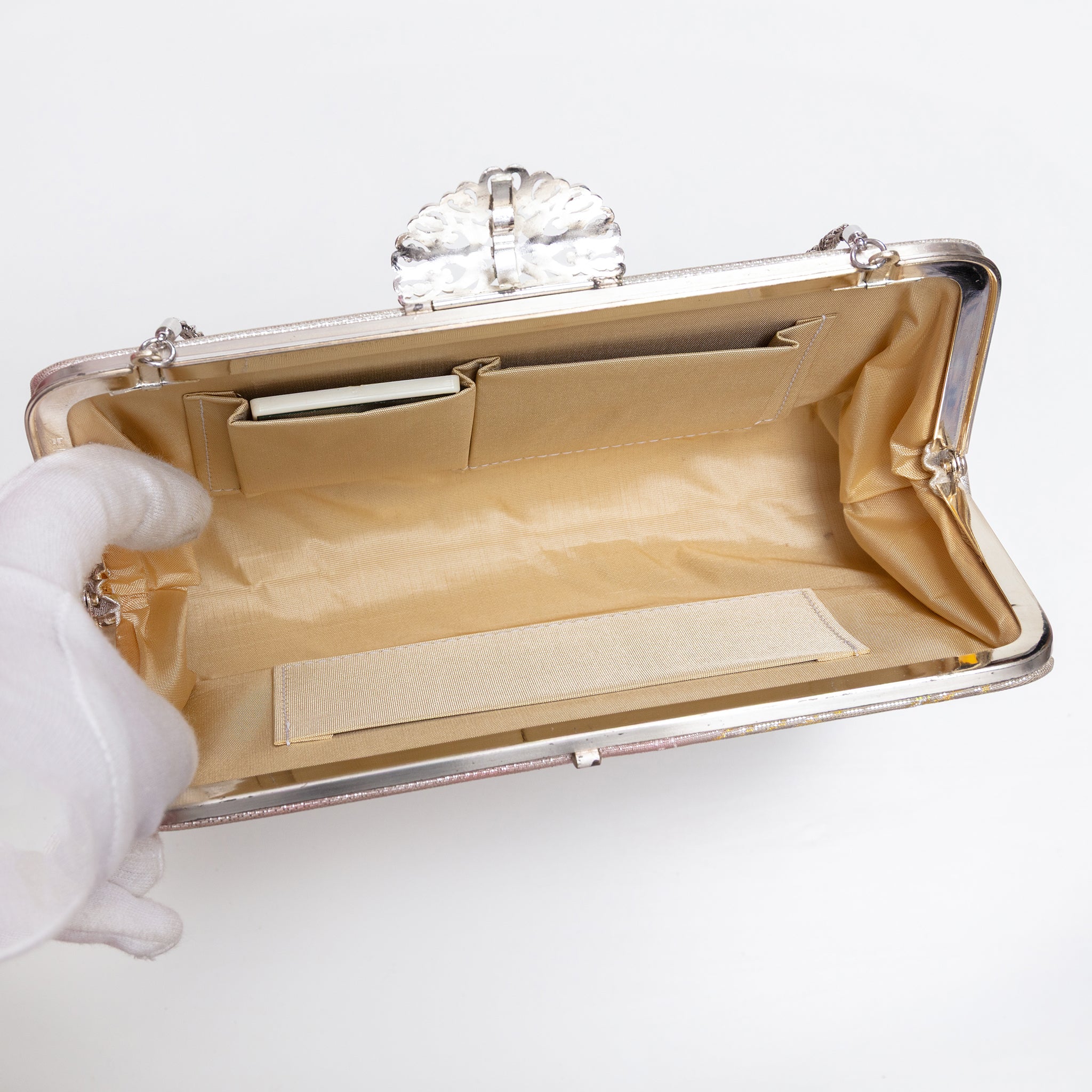 Open vintage Japanese silk clutch bag with silver-tone chain extended, three internal pockets and original vintage mirror.