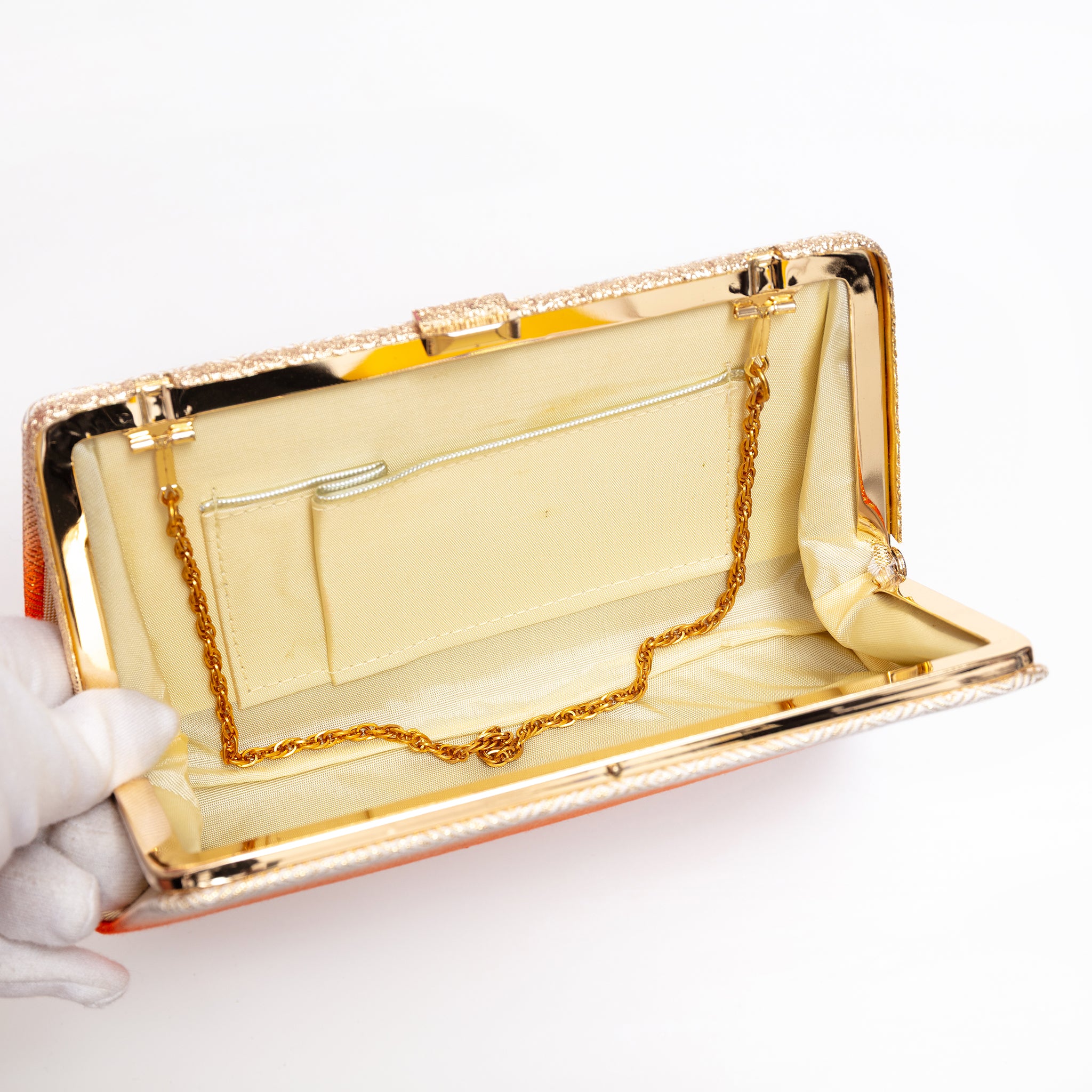 Open vintage Japanese silk clutch bag with gold-tone chain tucked inside