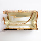 Open vintage Japanese silk clutch bag with gold-tone chain tucked inside