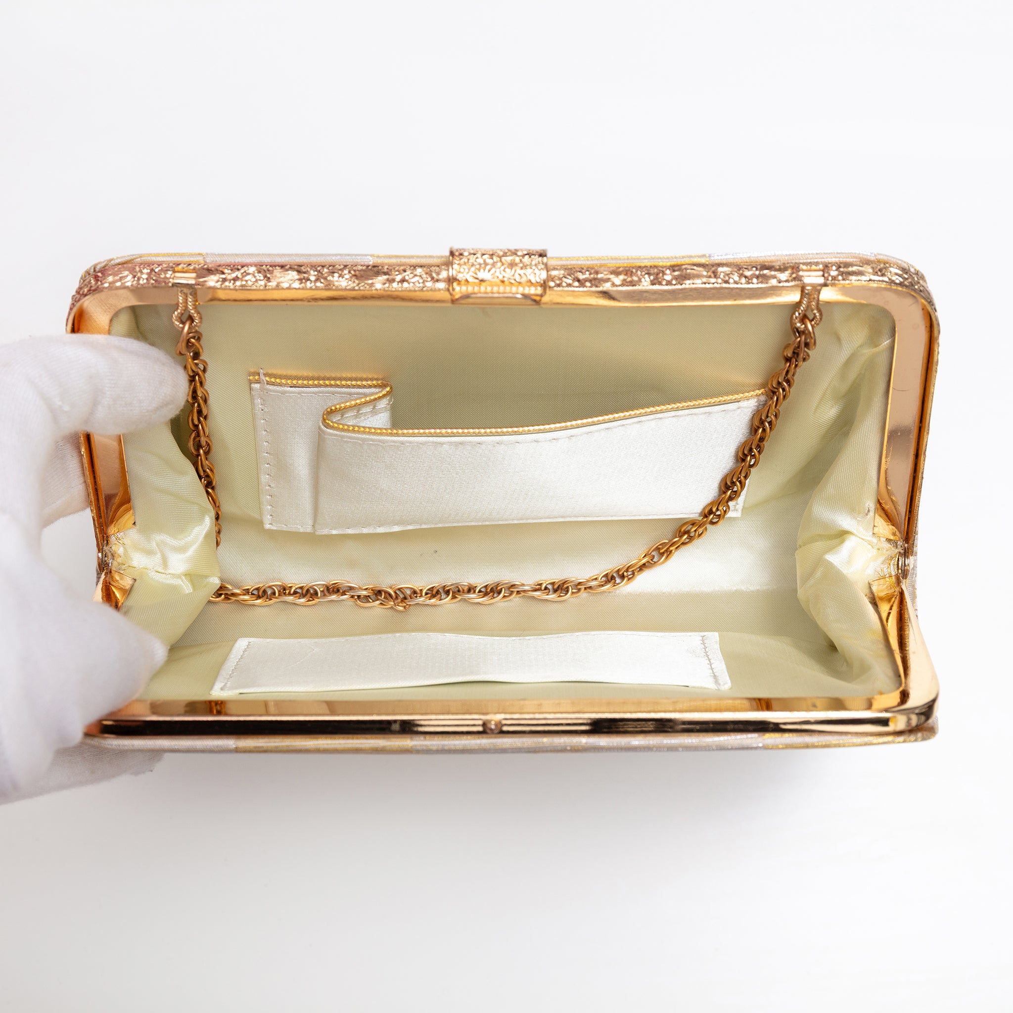 Open vintage Japanese silk clutch bag with gold-tone chain tucked inside