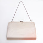 Back of metallic peach and gold vintage Japanese silk clutch bag