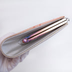 Detail of silver tone frame rainbow tarnish.