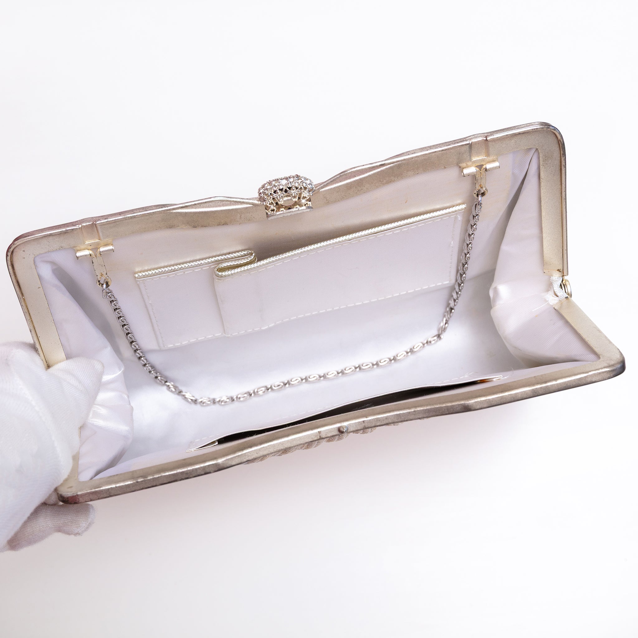 Open vintage Japanese silk clutch bag with silver-tone chain tucked inside