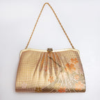 Gold Japanese kimono silk clutch bag with stylised crane and cherry blossom design