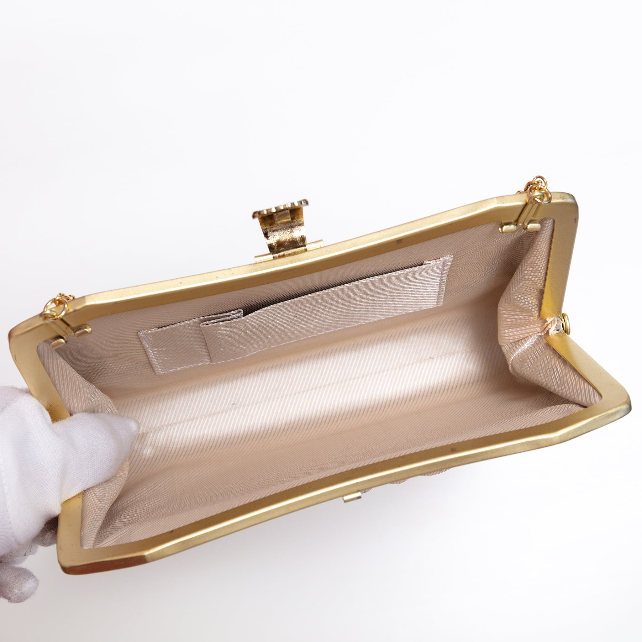 Open vintage Japanese silk clutch bag with gold-tone chain extended, lined in beige twill silk with internal pocket.