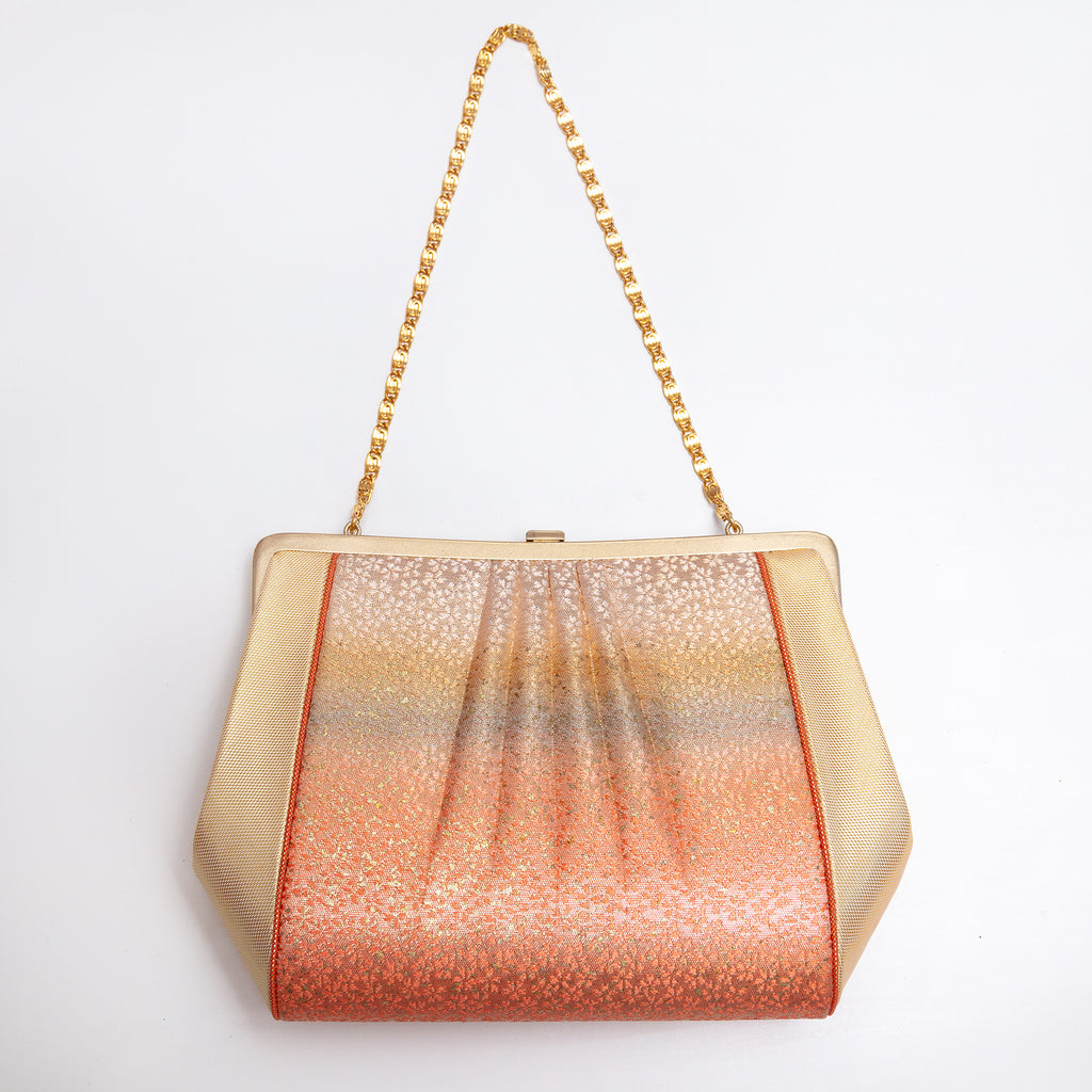 Back of metallic Japanese silk clutch bag with gathered abstract ombré design