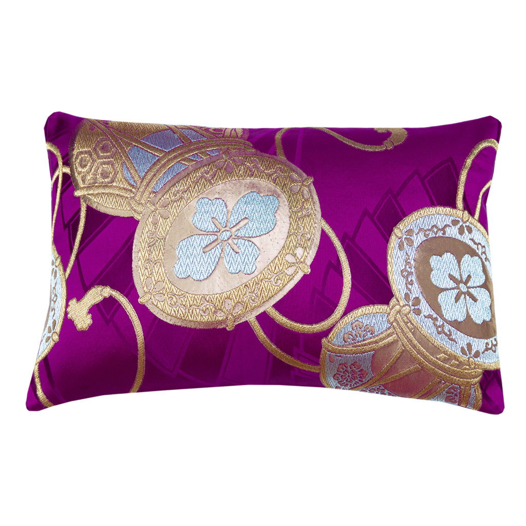 A vintage purple Japanese obi silk cushion with gold and silver drum embroidery