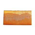 Reverse view of a vintage Japanese clutch bag in gold and bronze 