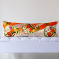 Orange ombré silk kimono bolster cushion with floral medallions and bamboo leaves, crafted from vintage Japanese silk