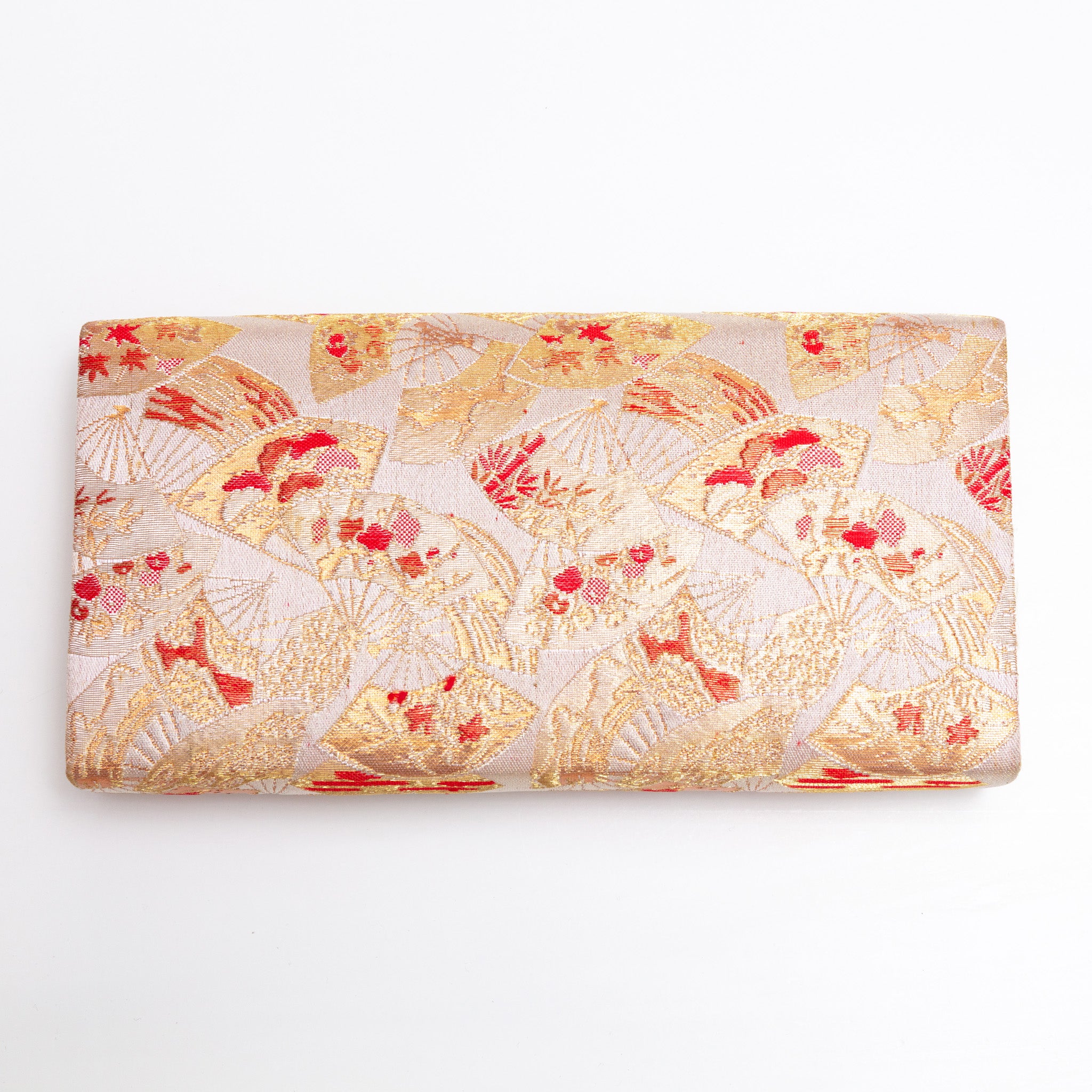 Back view of gold vintage Japanese silk clutch bag with small fan and flower pattern