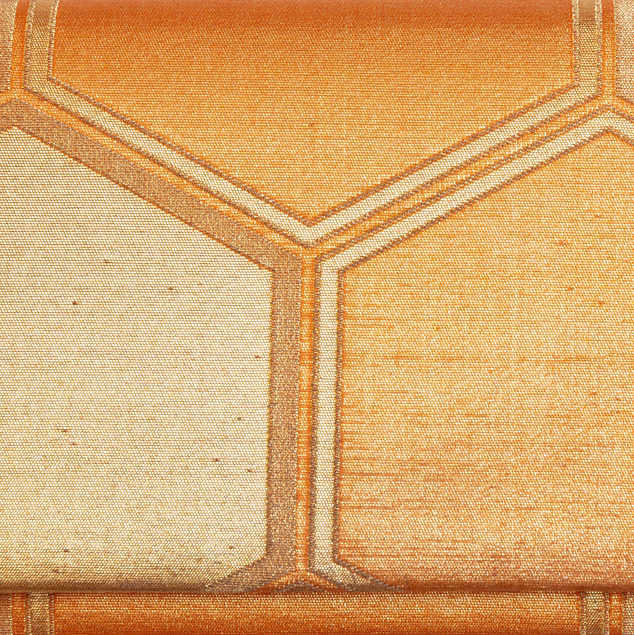 Close-up of oversized Kikkō hexagons woven into metallic gold kimono silk