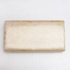 Back view of gold vintage Japanese silk clutch bag with subtle mottled metallic pattern
