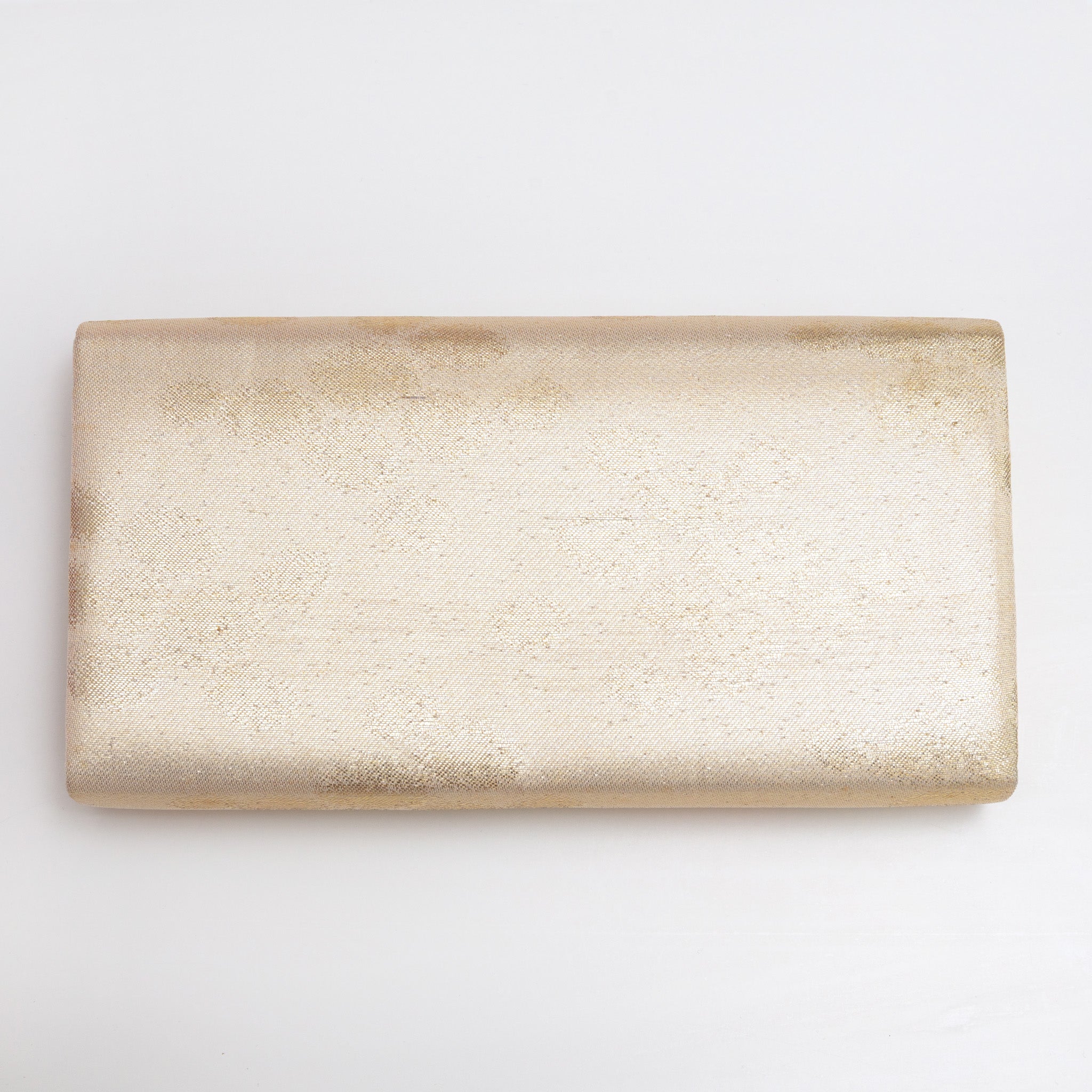 Back view of gold vintage Japanese silk clutch bag with subtle mottled metallic pattern
