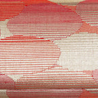 Close-up of red-gold abstract cloud design woven into vintage kimono silk