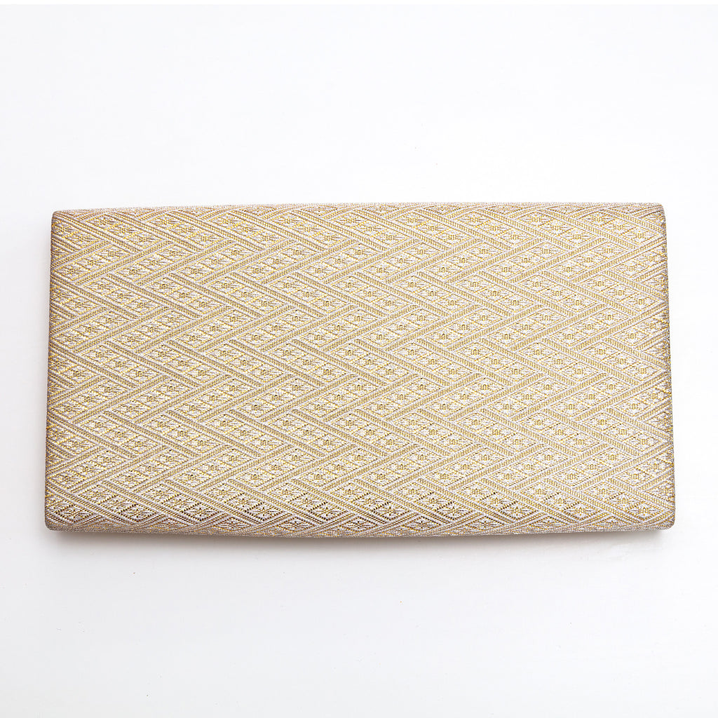 Back view of gold kimono silk clutch bag with woven diamond geometric texture