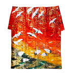 Silk throw in vintage uchikake kimono silk with cranes, fans and river pattern in red, yellow and green