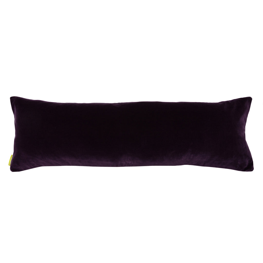 Close-up of the richly textured purple velvet border and intricate crane embroidery detail on the crimson silk pillow edge