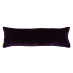 Close-up of the richly textured purple velvet border and intricate crane embroidery detail on the crimson silk pillow edge