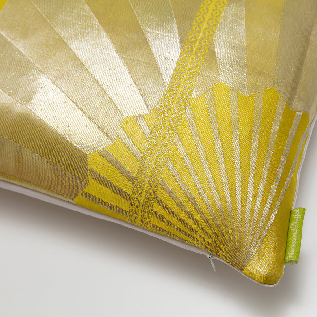 Close-up of gold embroidery and textured silk fabric highlighting intricate Obi pattern on the Kimono Pillow pair from a