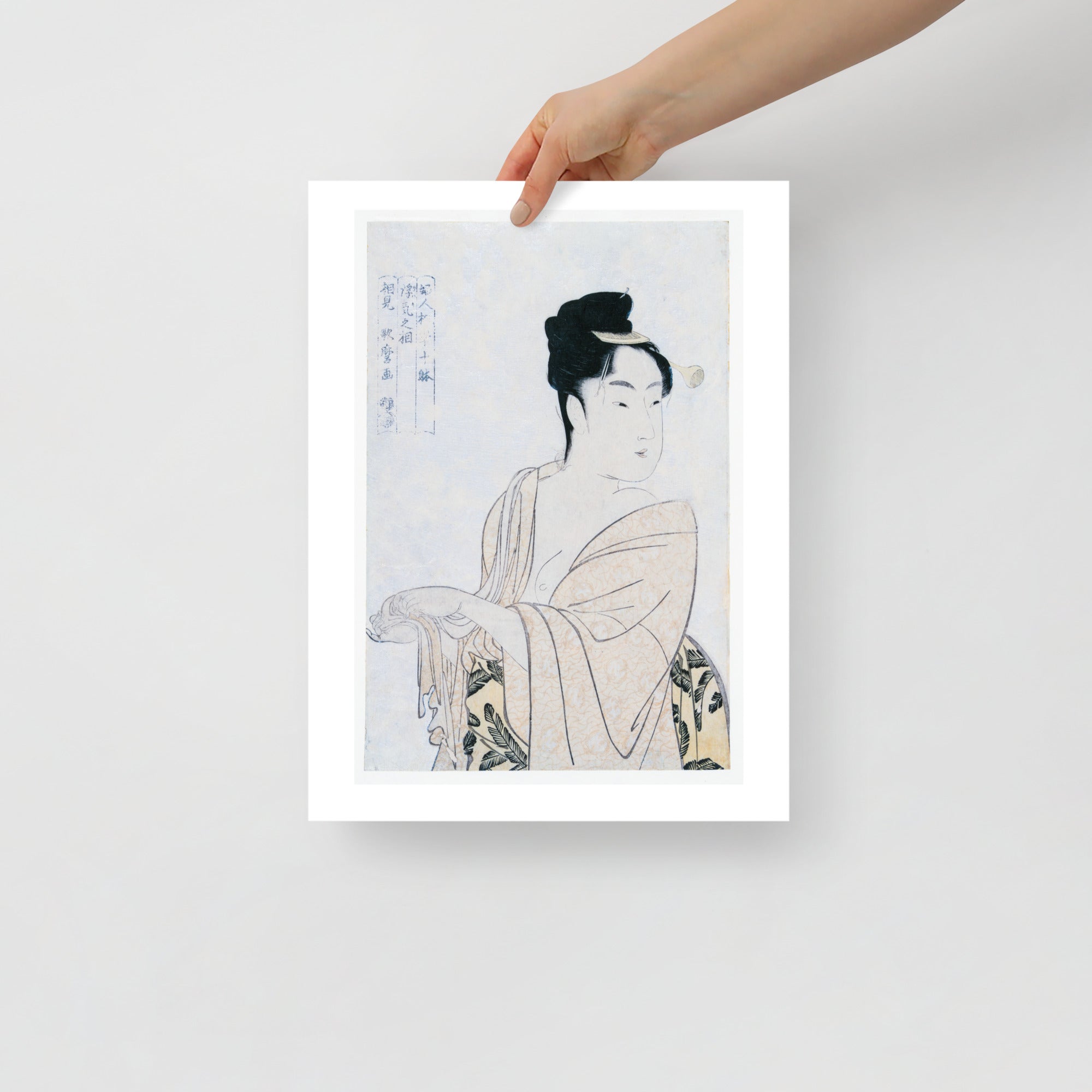 Close-up of the print’s intricate line work and delicate color gradation highlighting Utamaro’s expressive facial features