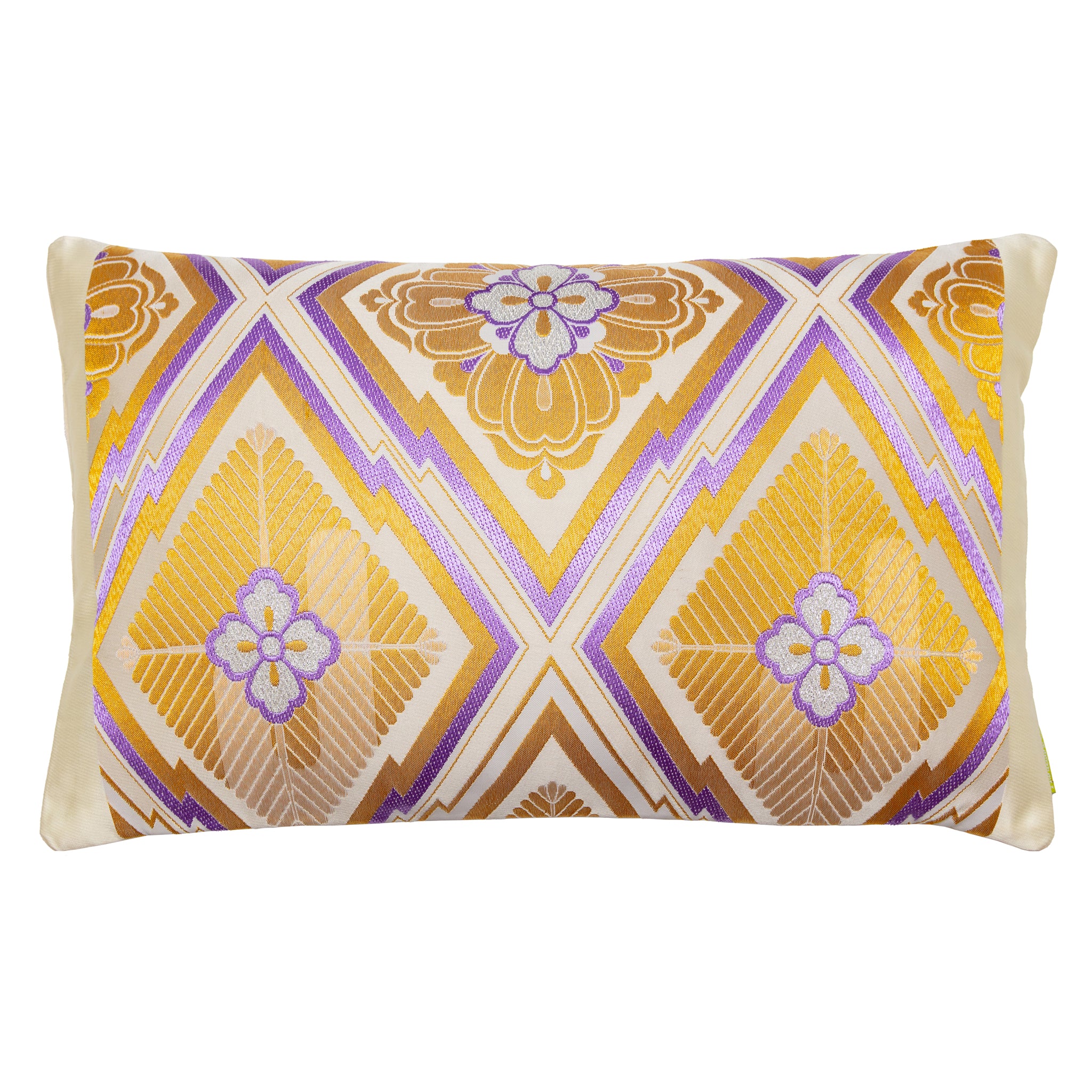 A rectangular cushion with a vintage obi design featuring a pine bark and hanabishi flower pattern in gold and purple colors, with cream velvet reverse and cream silk borders.