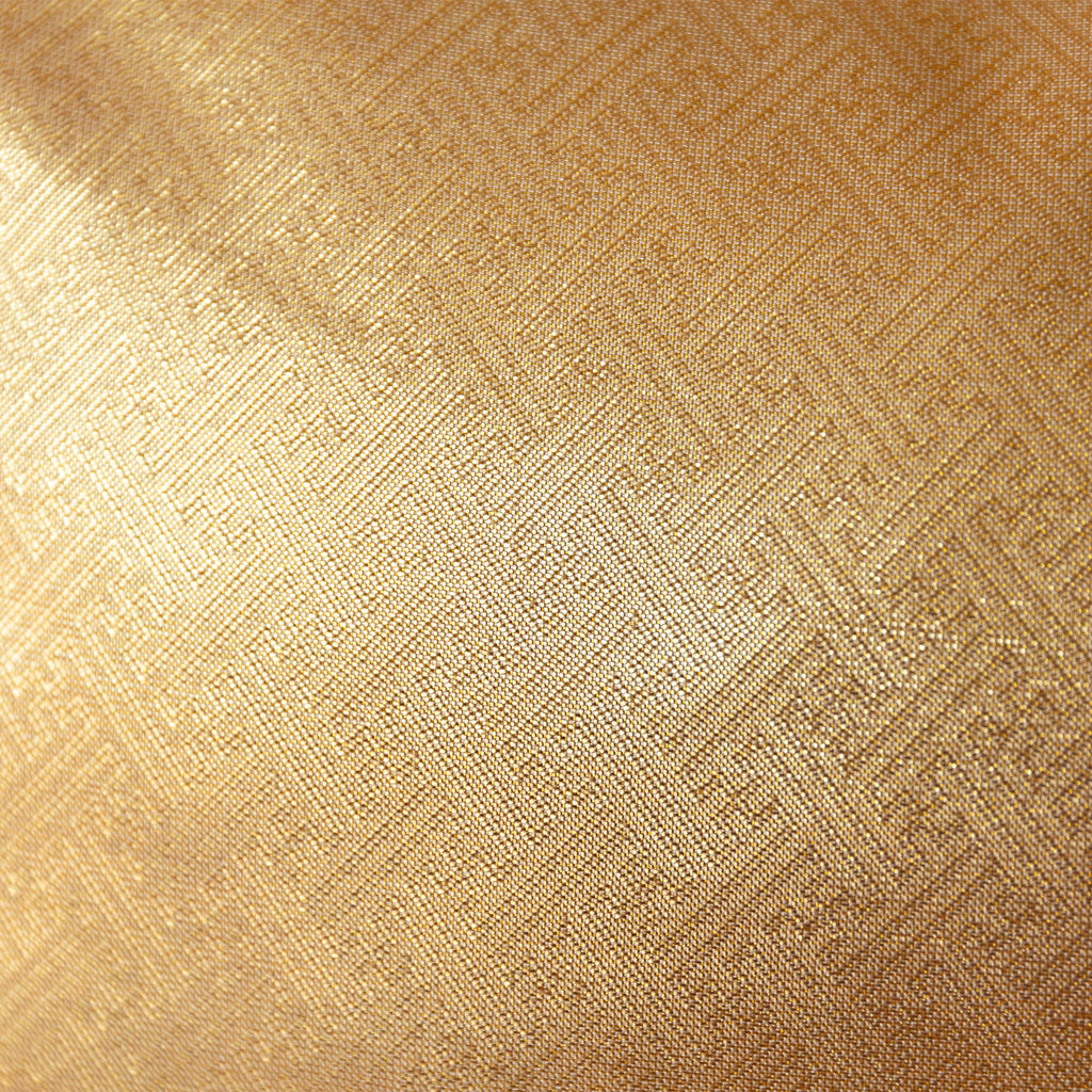 Close-up of a gold textured silk obi cushion reverse surface with a geometric pattern