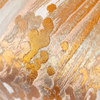 Close-up of araumi wave motif in gold and silver metallic thread on vintage Japanese obi silk