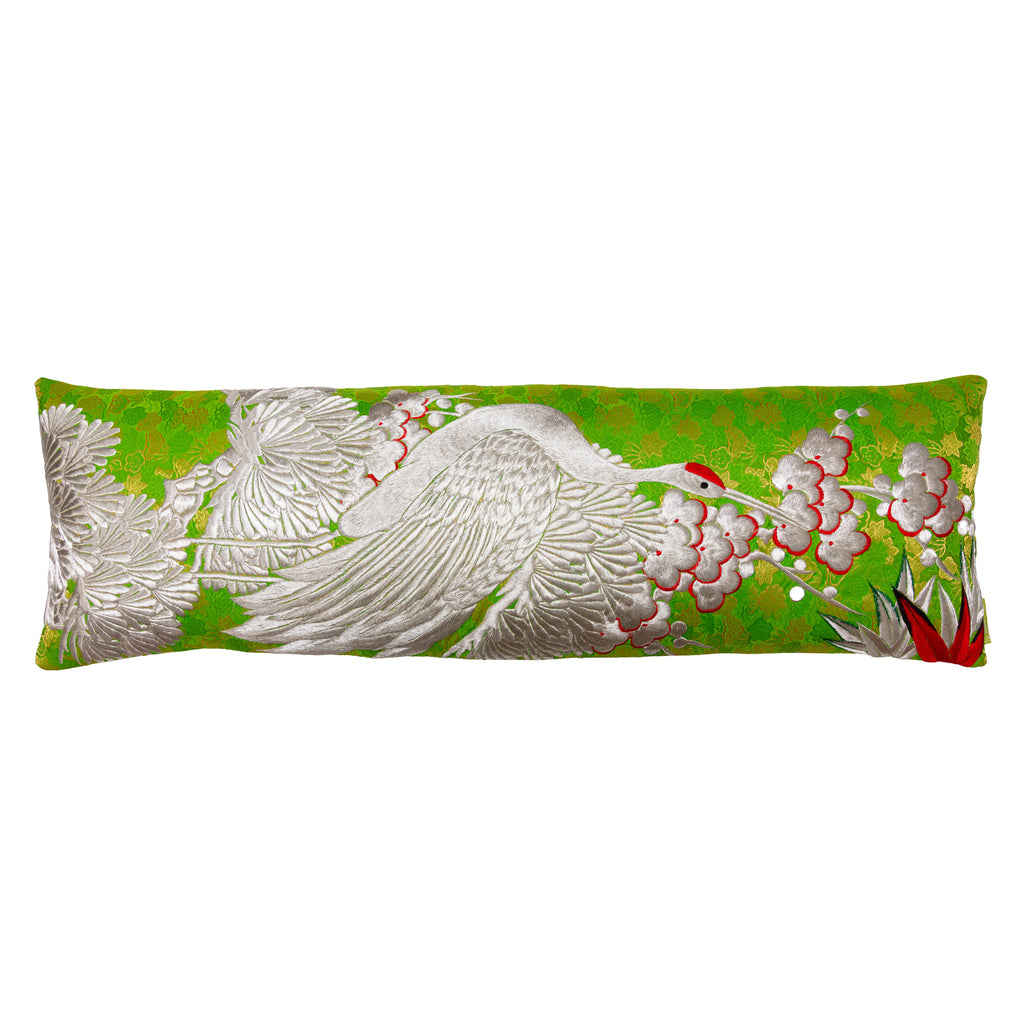 long bolster cushion in vintage kimono silk with silver crane, pine and blossom embroidery over green brocade 