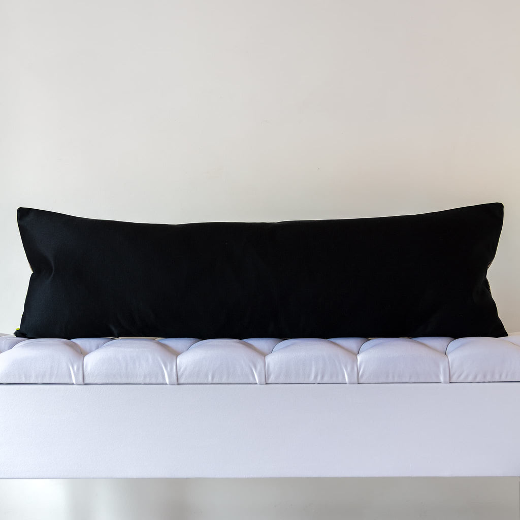 Reverse side of grey silk bolster cushion in vintage black silk from a Japanese Maru Obi