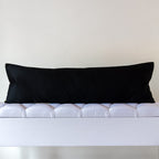 Reverse side of grey silk bolster cushion in vintage black silk from a Japanese Maru Obi