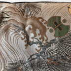 Detail of wild wave and pine motifs woven on grey Japanese Maru Obi silk bolster cushion