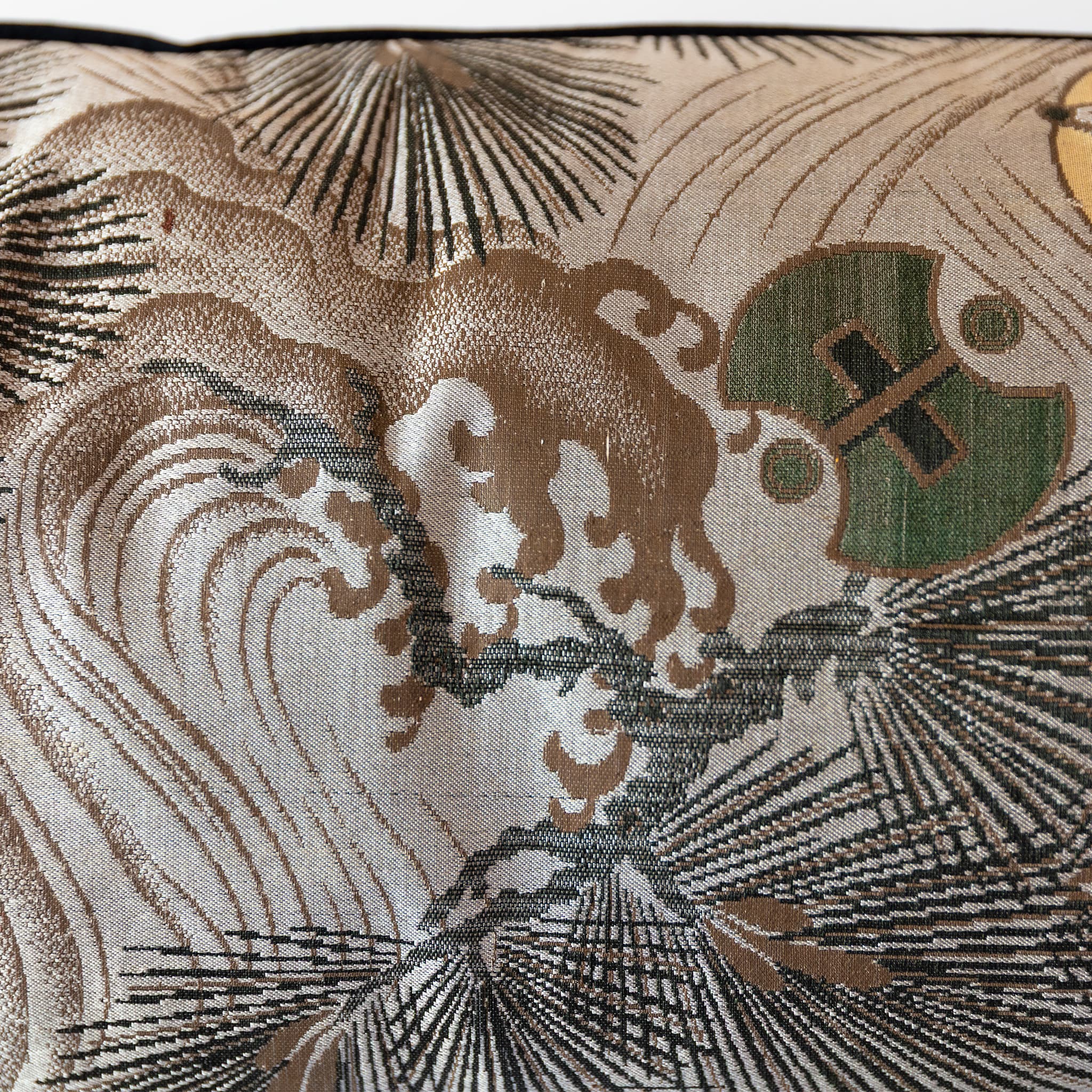 Detail of wild wave and pine motifs woven on grey Japanese Maru Obi silk bolster cushion