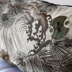 Close-up of wild wave motif woven on grey vintage Japanese Maru Obi silk bolster cushion